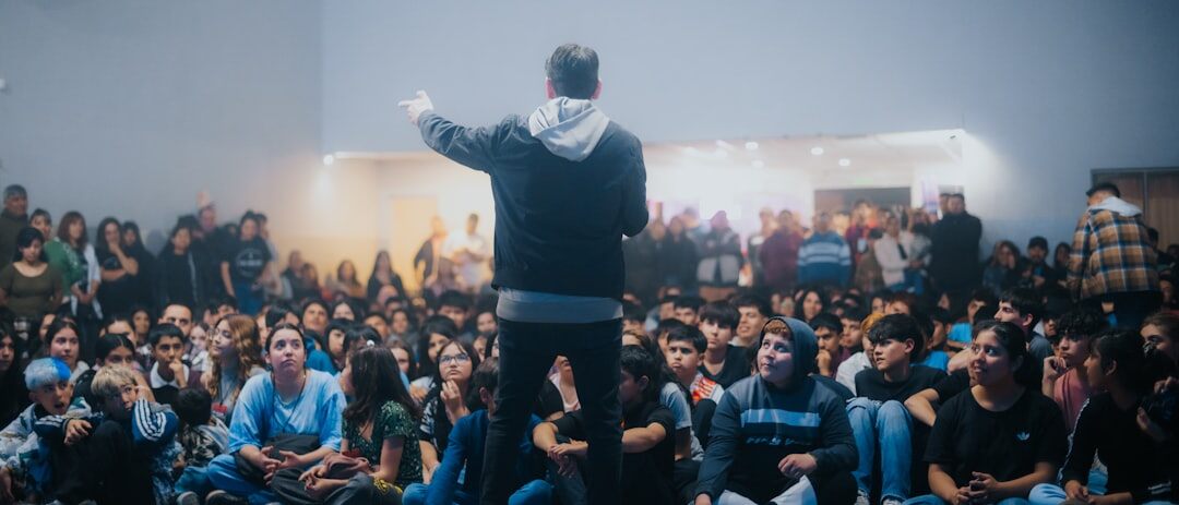 person speaking in front of audience