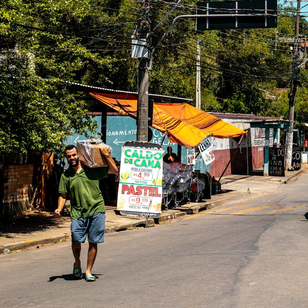 Young Brazilian man practicing public speaking with note cards