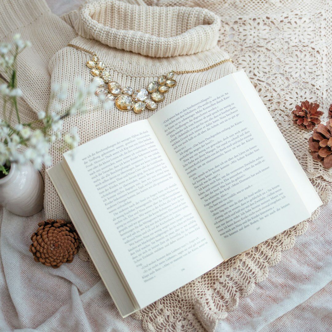 Open book with soft light on a table