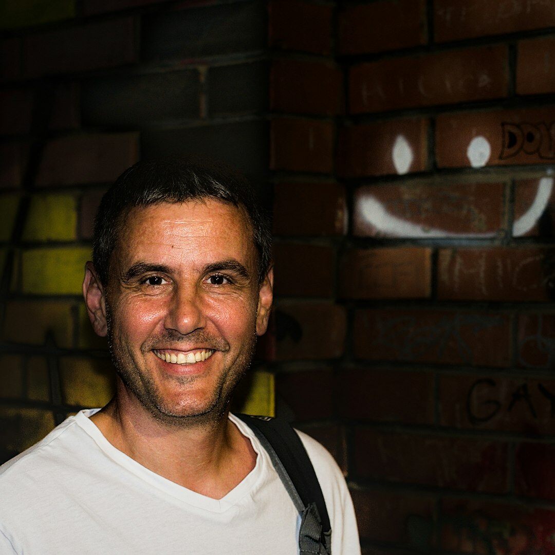 Portrait of a smiling Brazilian man with short beard